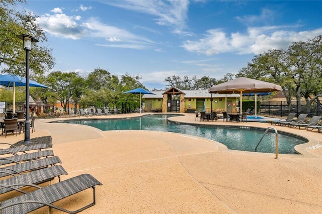 2232 Skippy Cv, Leander, TX 78641 - community pool with a patio