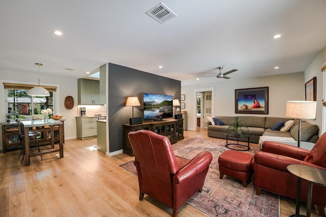 1509 Ridgehaven Dr, Austin, TX 78723 - living area with light wood-type flooring, ceiling fan, and recessed lighting