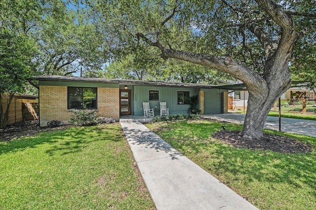 1509 Ridgehaven Dr, Austin, TX 78723 - view of front of home with driveway, an attached garage, and brick siding
