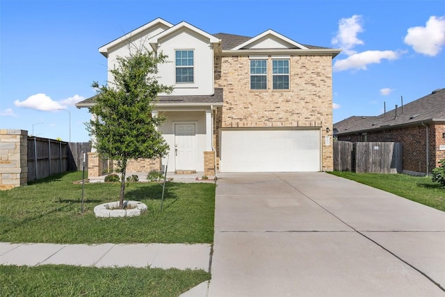 11825 Monterosso Dr, Austin, TX 78754 - traditional-style house with concrete driveway, a garage, brick siding, and stucco siding