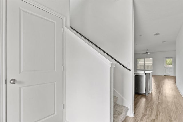 11825 Monterosso Dr, Austin, TX 78754 - stairway featuring wood finished floors and ceiling fan