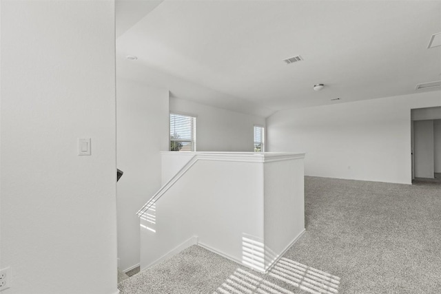 11825 Monterosso Dr, Austin, TX 78754 - hallway featuring an upstairs landing and carpet floors