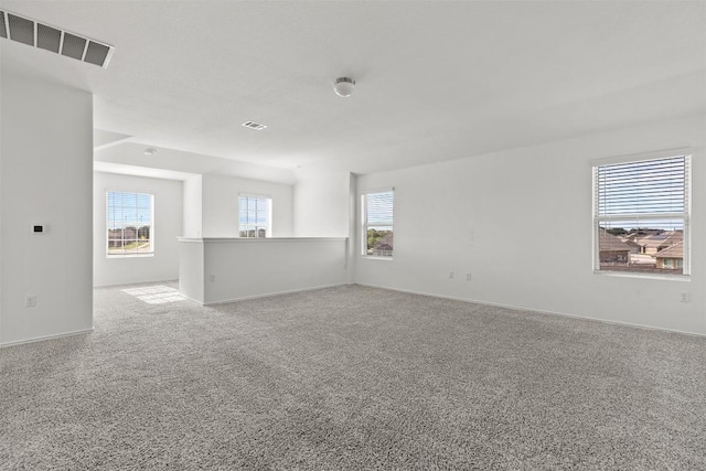 11825 Monterosso Dr, Austin, TX 78754 - carpeted empty room with baseboards