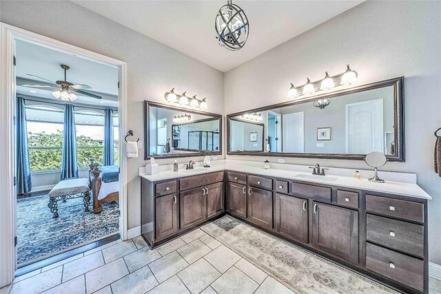 110 Waverly Spire Ct, Austin, TX 78738 - full bath with ensuite bathroom, double vanity, and ceiling fan
