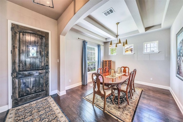 110 Waverly Spire Ct, Austin, TX 78738 - dining room with dark wood finished floors, healthy amount of natural light, beam ceiling, arched walkways, and coffered ceiling
