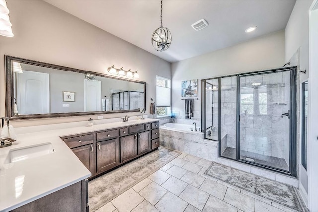 110 Waverly Spire Ct, Austin, TX 78738 - full bathroom with a garden tub, double vanity, a shower stall, a chandelier, and recessed lighting