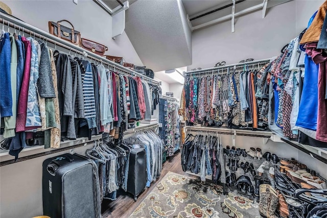 110 Waverly Spire Ct, Austin, TX 78738 - walk in closet featuring wood finished floors