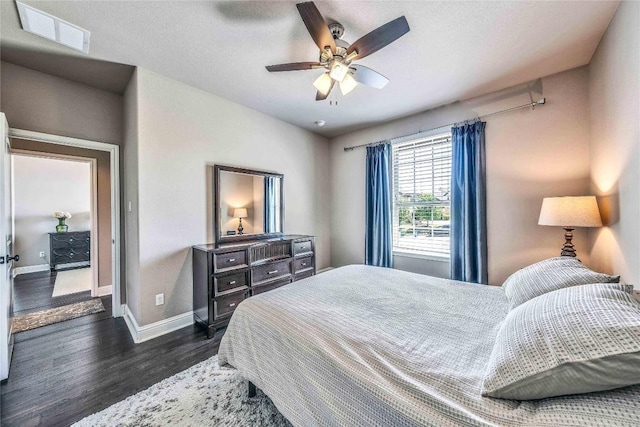 110 Waverly Spire Ct, Austin, TX 78738 - bedroom featuring dark wood-style flooring and a ceiling fan