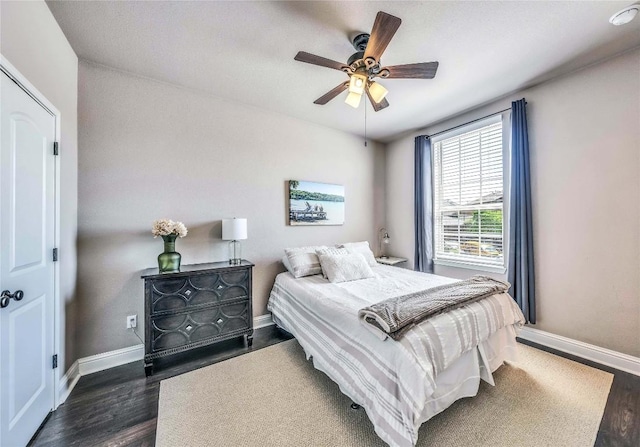 110 Waverly Spire Ct, Austin, TX 78738 - bedroom featuring dark wood-style flooring and a ceiling fan