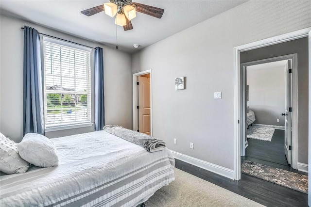 110 Waverly Spire Ct, Austin, TX 78738 - bedroom featuring dark wood-type flooring and ceiling fan