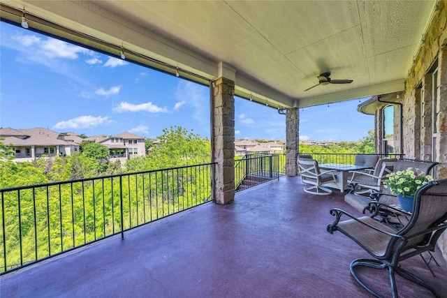 110 Waverly Spire Ct, Austin, TX 78738 - balcony with a ceiling fan and a residential view