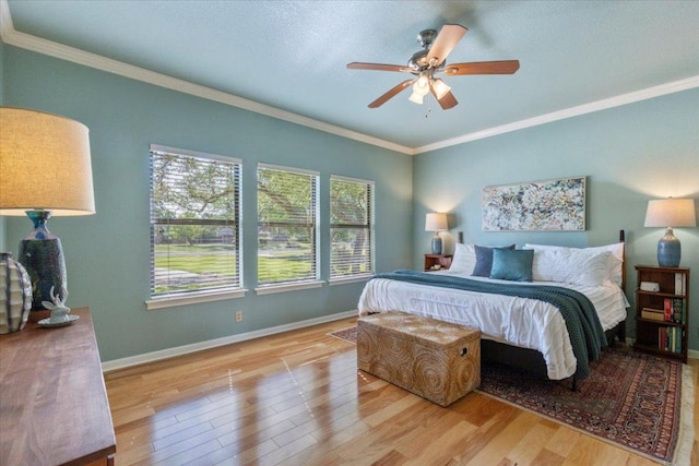 3004 Quail Run Dr, Round Rock, TX 78681 - bedroom featuring wood finished floors, ornamental molding, and ceiling fan