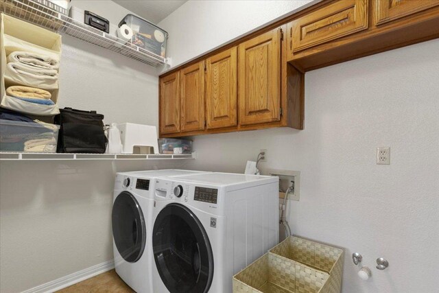 3004 Quail Run Dr, Round Rock, TX 78681 - laundry area featuring washing machine and clothes dryer and cabinet space