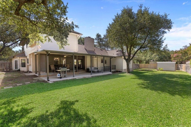 3004 Quail Run Dr, Round Rock, TX 78681 - rear view of property with a fenced backyard, ceiling fan, a chimney, and a patio