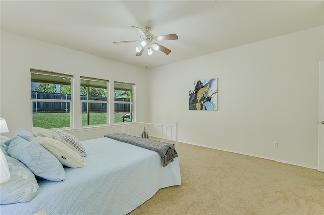 7008 Wandering Oak Rd, Austin, TX 78749 - carpeted bedroom with ceiling fan and baseboards