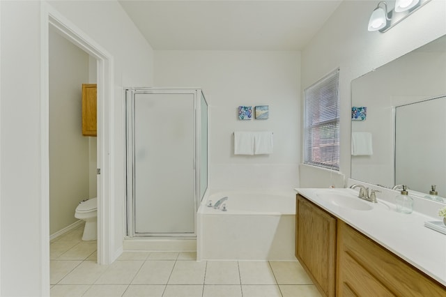 7008 Wandering Oak Rd, Austin, TX 78749 - full bath with tile patterned floors, a bath, vanity, and a shower stall