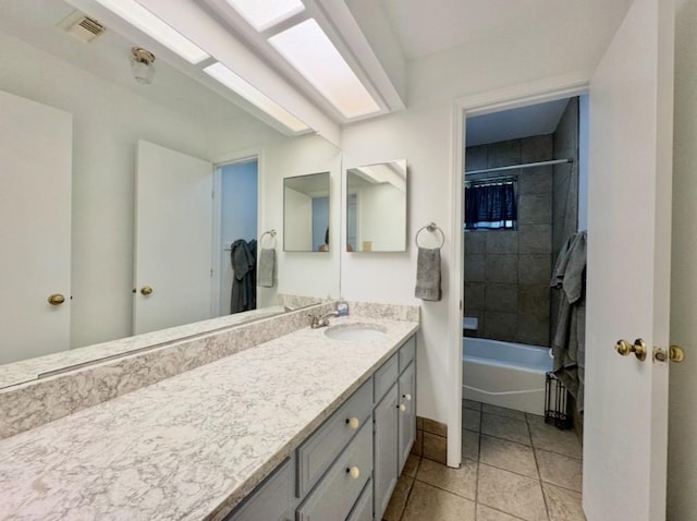 224 Crooked Hollow Dr, Elgin, TX 78621 - full bath with vanity, washtub / shower combination, and tile patterned floors