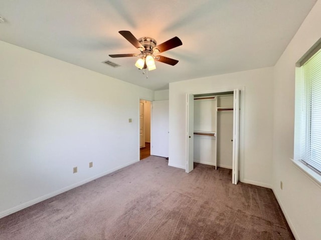 224 Crooked Hollow Dr, Elgin, TX 78621 - unfurnished bedroom featuring carpet, a ceiling fan, and a closet