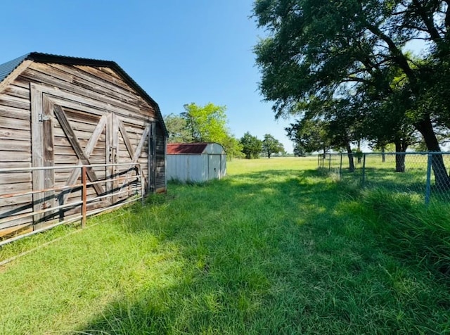 224 Crooked Hollow Dr, Elgin, TX 78621 - view of yard featuring a storage unit