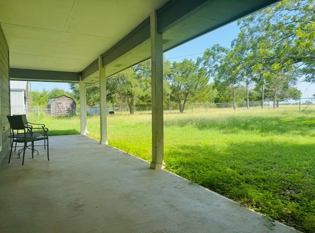 224 Crooked Hollow Dr, Elgin, TX 78621 - view of patio with a shed