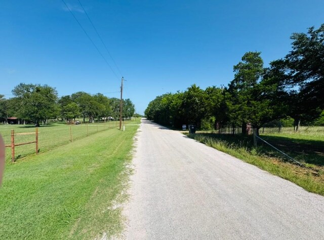 224 Crooked Hollow Dr, Elgin, TX 78621 - view of asphalt street with a rural view