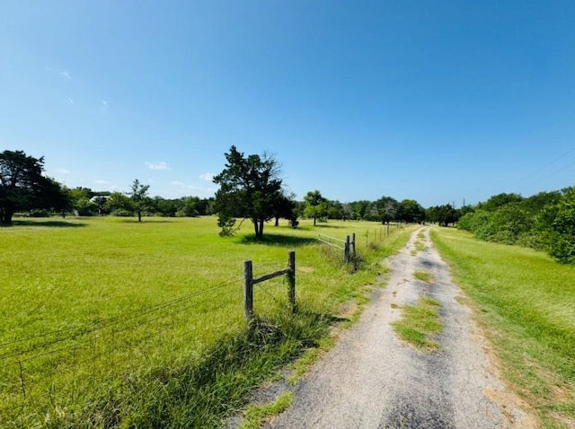 224 Crooked Hollow Dr, Elgin, TX 78621 - view of street with a rural view