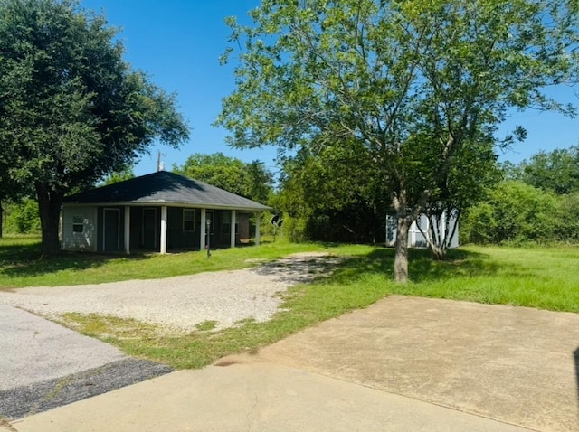224 Crooked Hollow Dr, Elgin, TX 78621 - view of home's community featuring a yard