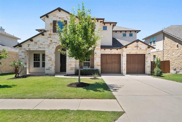 4108 Logan Ridge Dr, Cedar Park, TX 78613 - french country home with stone siding, driveway, and an attached garage