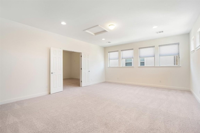 4108 Logan Ridge Dr, Cedar Park, TX 78613 - unfurnished room with attic access, light colored carpet, and recessed lighting
