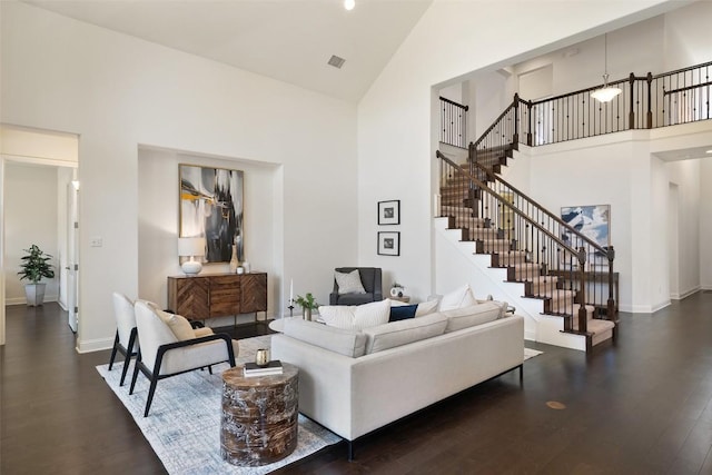 4108 Logan Ridge Dr, Cedar Park, TX 78613 - living area with high vaulted ceiling, dark wood-type flooring, and stairs