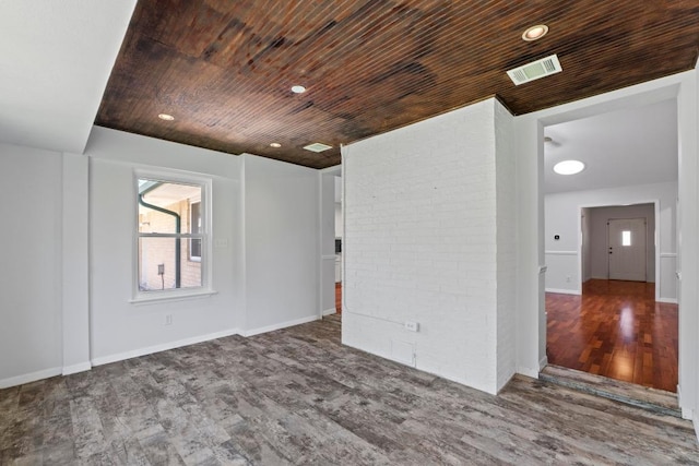 501 Meadowbrook Dr, Georgetown, TX 78628 - unfurnished room with wood finished floors and wood ceiling