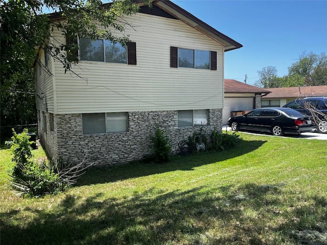 6005 Walnut Hills Dr, Austin, TX 78723 - view of side of property featuring stone siding, a yard, and a garage