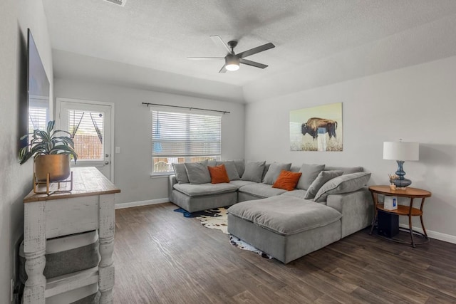 13911 Macquarie Dr, Pflugerville, TX 78660 - living room featuring dark wood finished floors, ceiling fan, and a textured ceiling