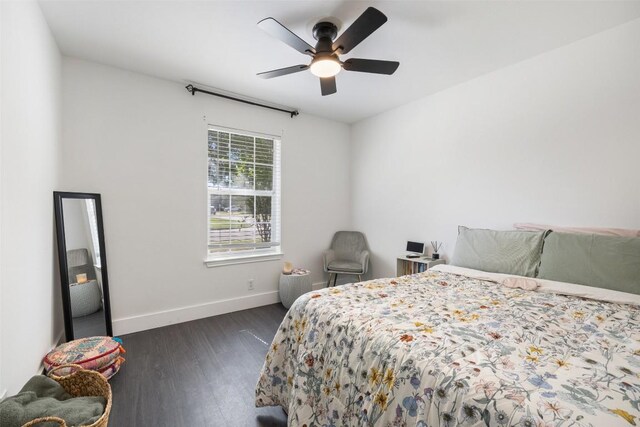 6001 Andross Ct, Hutto, TX 78634 - bedroom with dark wood-style flooring and ceiling fan