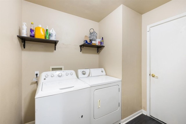 6001 Andross Ct, Hutto, TX 78634 - washroom with washing machine and dryer and baseboards