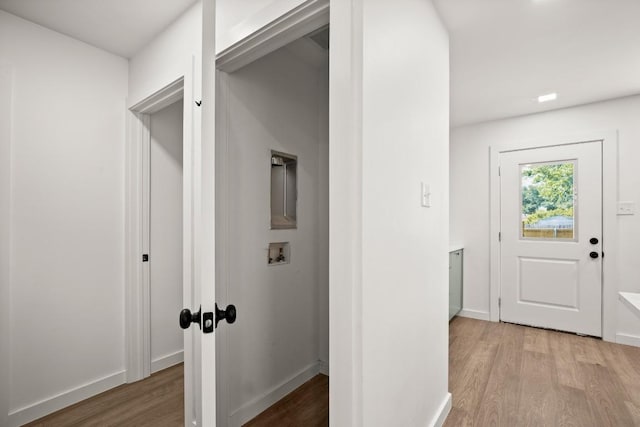 7913 W Gate Blvd Unit A, Austin, TX 78745 - corridor with light wood-style flooring and baseboards