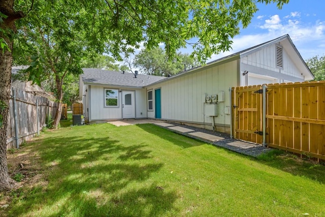 7913 W Gate Blvd Unit A, Austin, TX 78745 - rear view of property featuring a gate and a fenced backyard