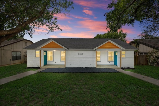 7913 W Gate Blvd Unit A, Austin, TX 78745 - ranch-style home with brick siding and roof with shingles