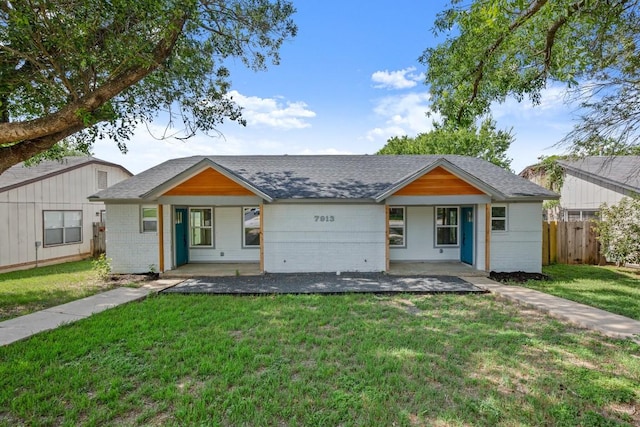 7913 W Gate Blvd Unit A, Austin, TX 78745 - view of front of property featuring roof with shingles and a porch