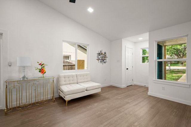 7913 W Gate Blvd Unit A, Austin, TX 78745 - living area with wood finished floors, recessed lighting, and vaulted ceiling