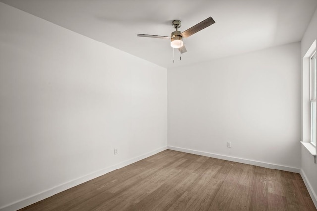 7913 W Gate Blvd Unit A, Austin, TX 78745 - unfurnished room featuring wood finished floors and a ceiling fan