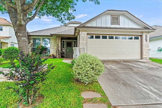 single story home featuring an attached garage, board and batten siding, concrete driveway, and stone siding