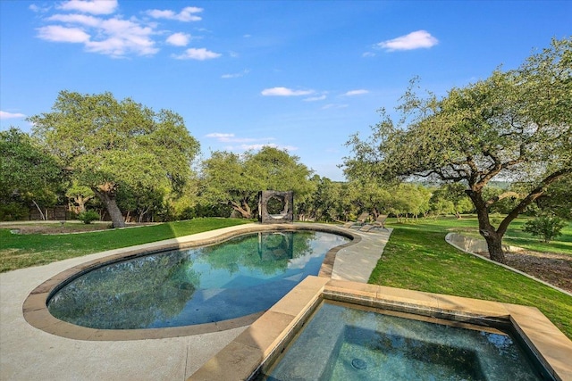 4275 Fm 3405, Georgetown, TX 78633 - swimming pool with an in-ground hot tub, a yard, and view of wooded area