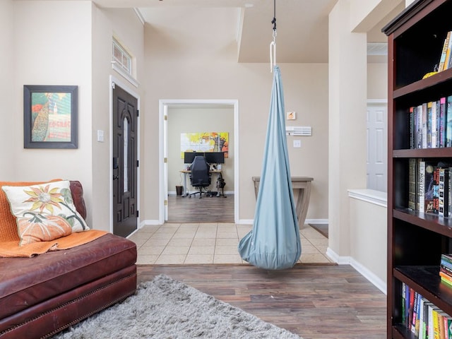 2407 Silver Spur Ln, Leander, TX 78641 - living area with tile patterned floors and a desk