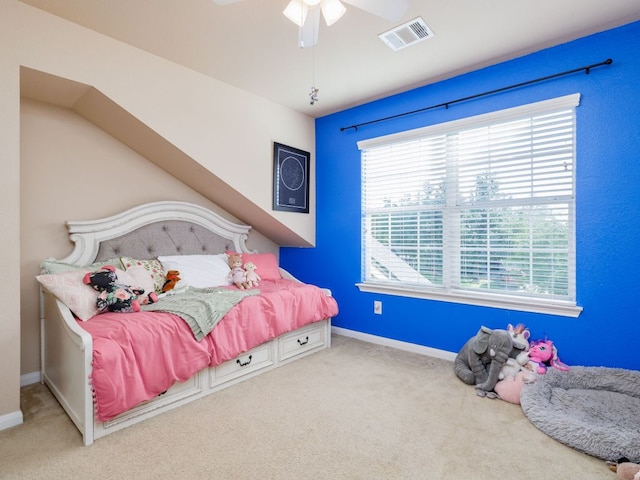 2407 Silver Spur Ln, Leander, TX 78641 - carpeted bedroom with baseboards and a ceiling fan