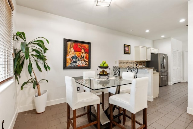8600 Cima Oak Ln Unit A15, Austin, TX 78759 - dining room featuring recessed lighting and light tile patterned floors