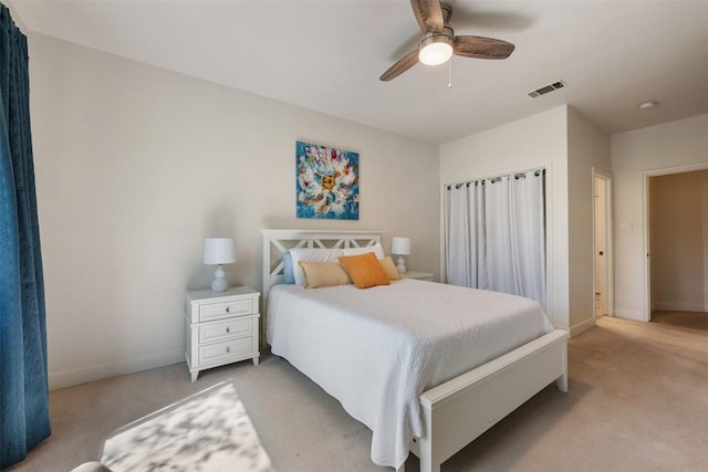 8600 Cima Oak Ln Unit A15, Austin, TX 78759 - carpeted bedroom with baseboards and ceiling fan