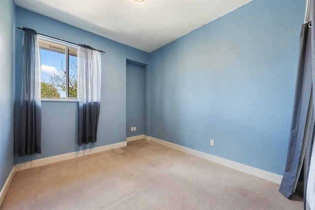 8600 Cima Oak Ln Unit A15, Austin, TX 78759 - carpeted spare room with baseboards