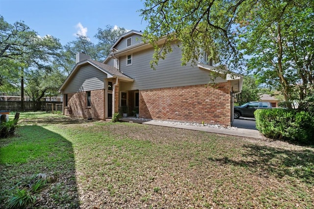 8600 Cima Oak Ln Unit A15, Austin, TX 78759 - rear view of property featuring brick siding and a chimney