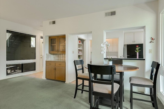 1707 Spyglass Dr Unit 41, Austin, TX 78746 - dining area with light carpet